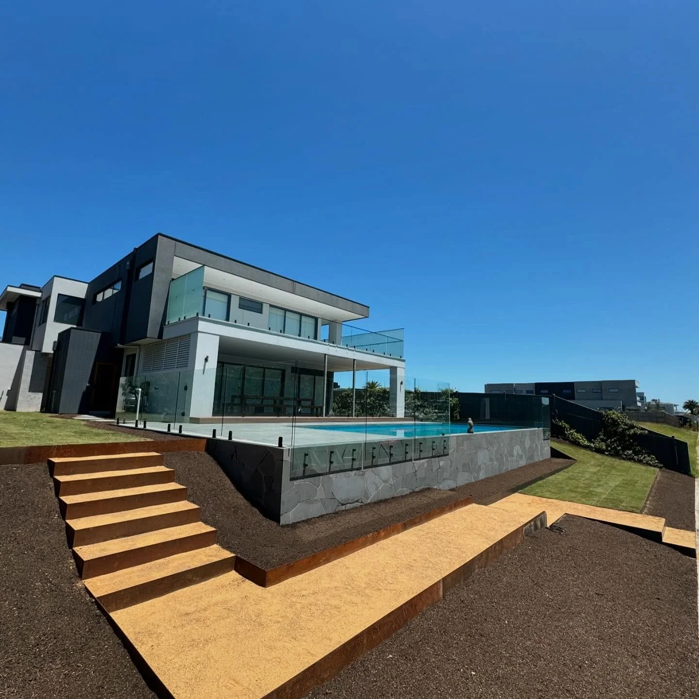 Safety beach 🏝️ nearing completion! Plants and lighting to come next year. A great project and big push for the year! @featurepools @foreshorepumpsandirrigation @coolabah_turf @mp.glassandscreens  @m_g_guy