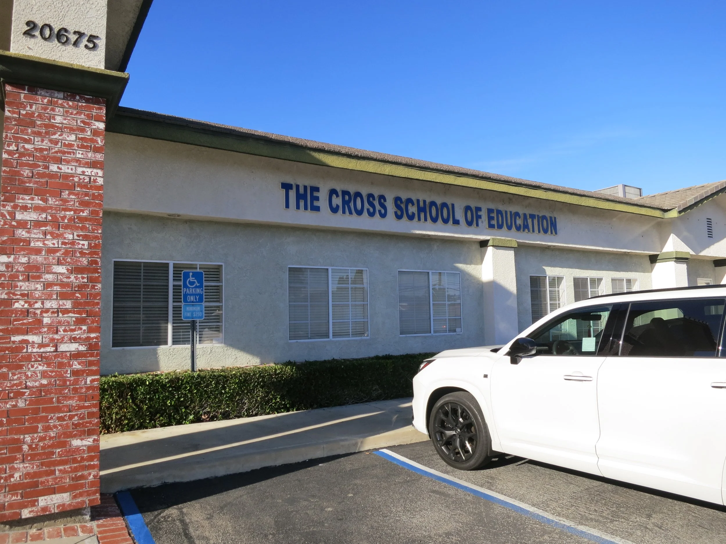 The top of The Cross Schools of Education building in Walnut, CA