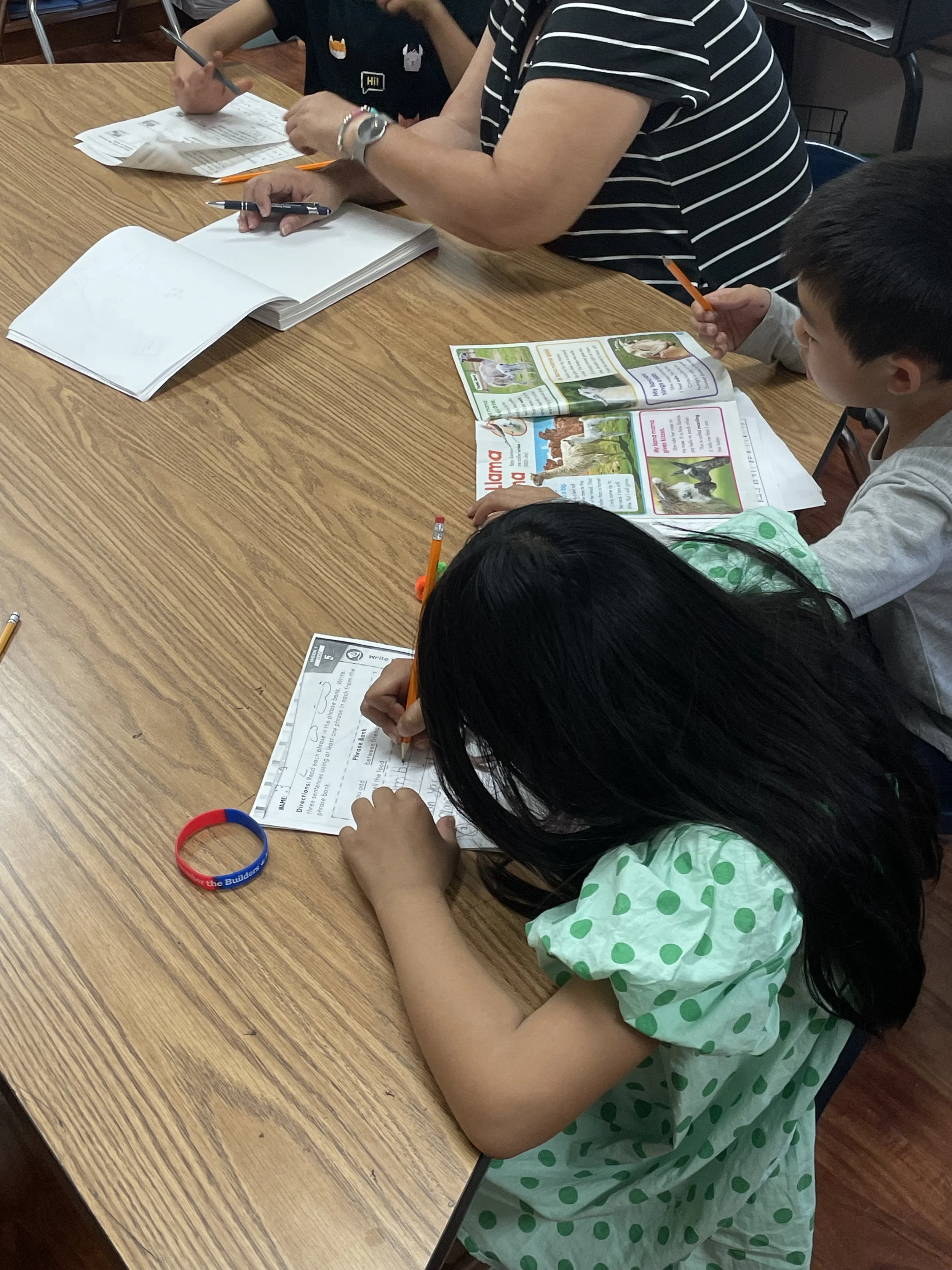 PT girl and boy working on stuff.jpeg