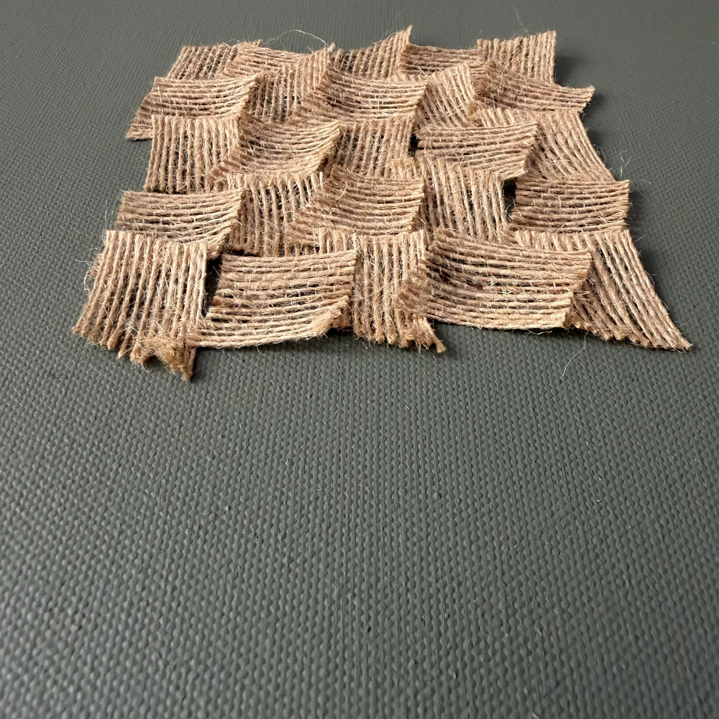 woven.jpeg a trio of 12x12 inch abstract fabric artwork with burnt green earth shade and a hessian fabric
