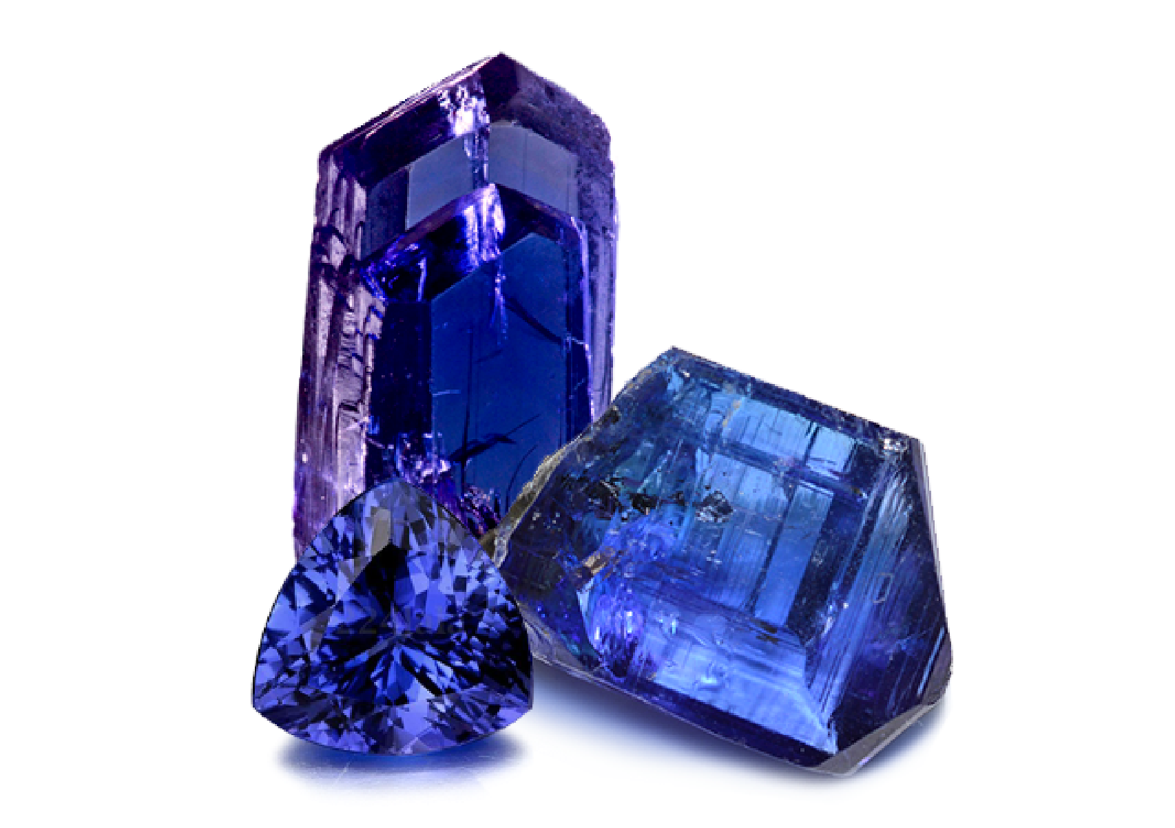 Three cut and polished gemstones, two blue and one purple, with a digital glitch background