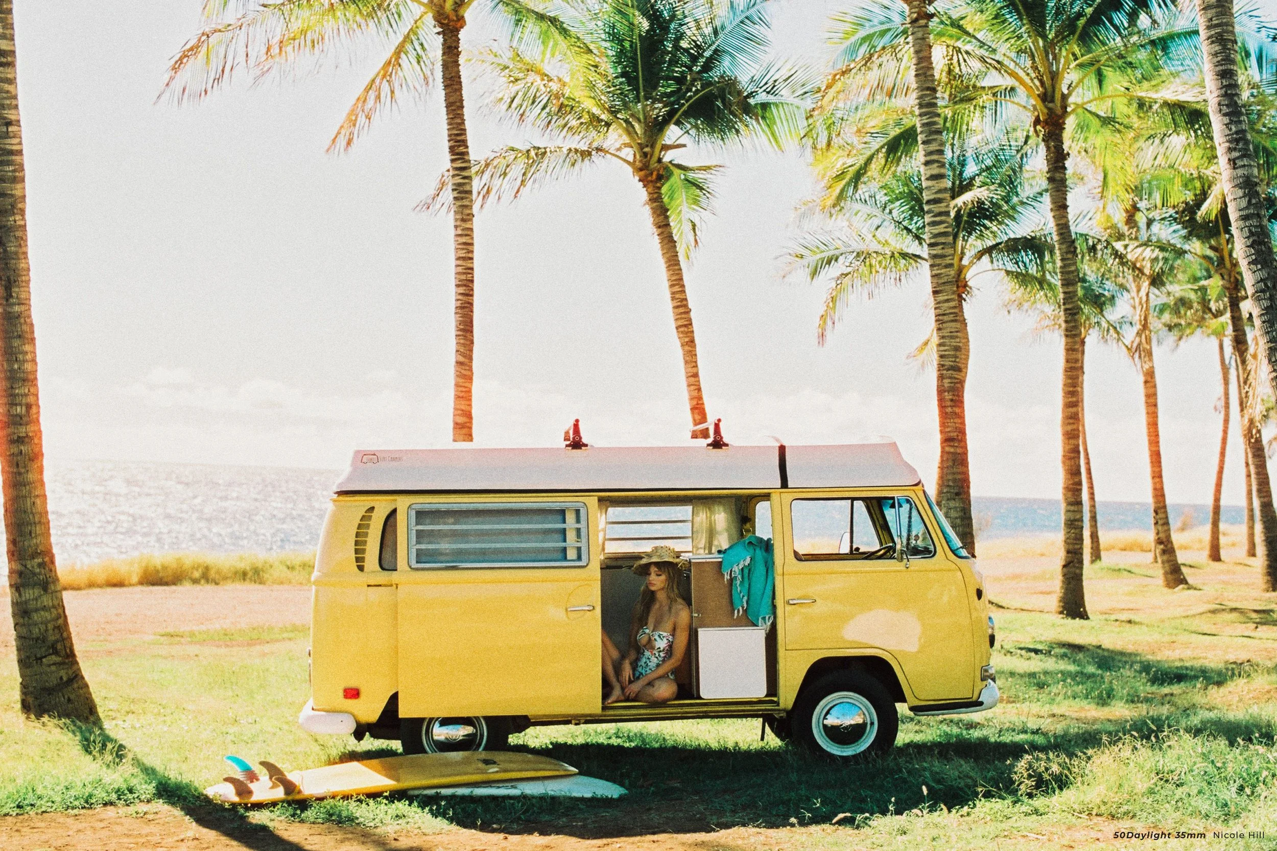 Cinestill 50D sample photo of a camper van parker at a beach