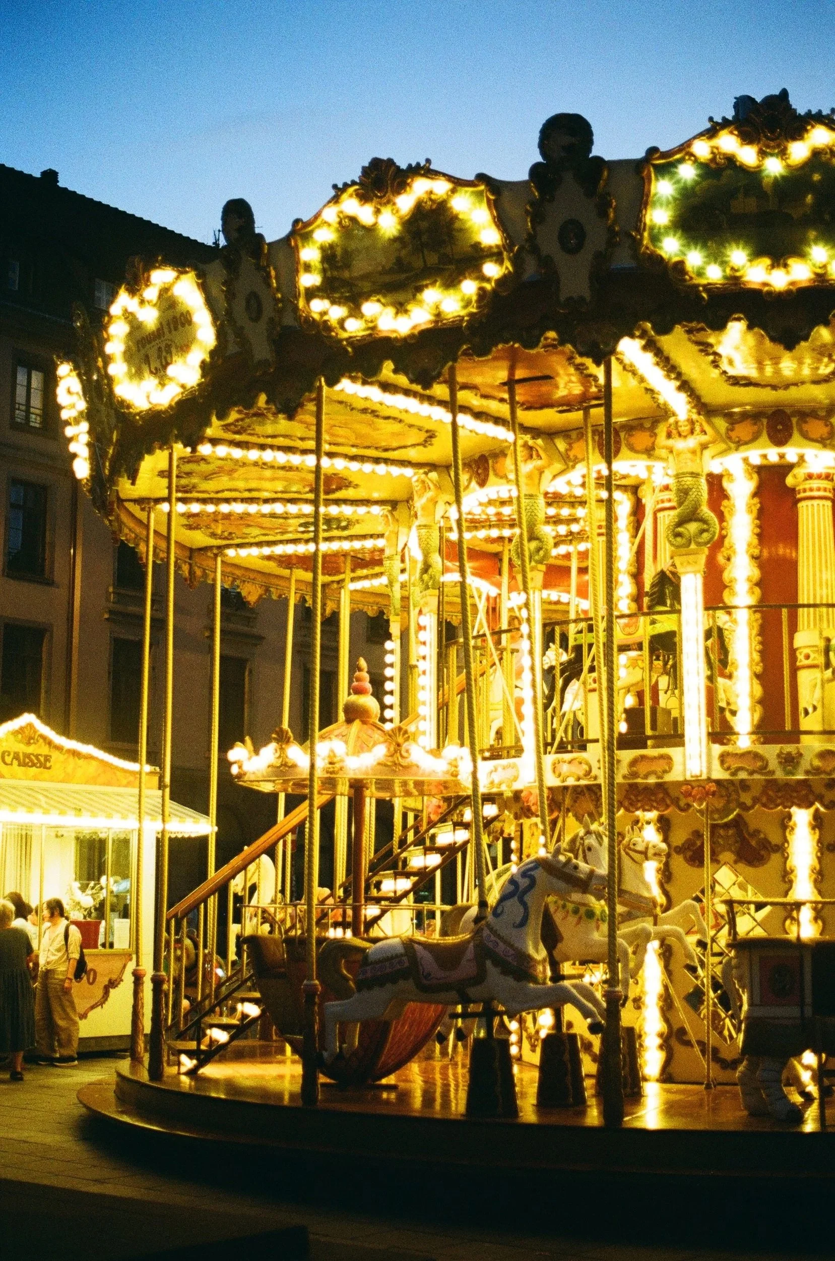 A carousel photographed in low light