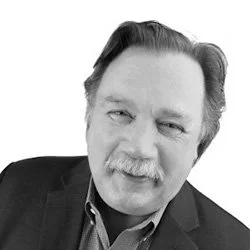 Black and white photo of Jim Ylisela, Co-Owner, Ragan Consulting