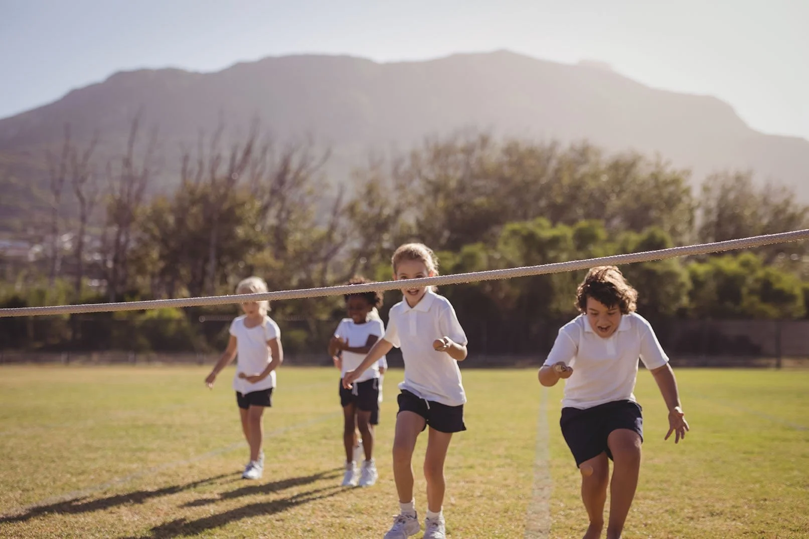 schoolgirls-running-toward-finishing-line.jpg