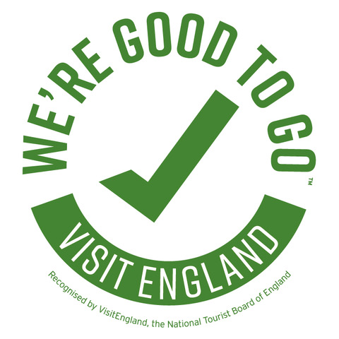Graphic with a green checkmark and the text "We're good to go" and "Visit England" in a circular arrangement.