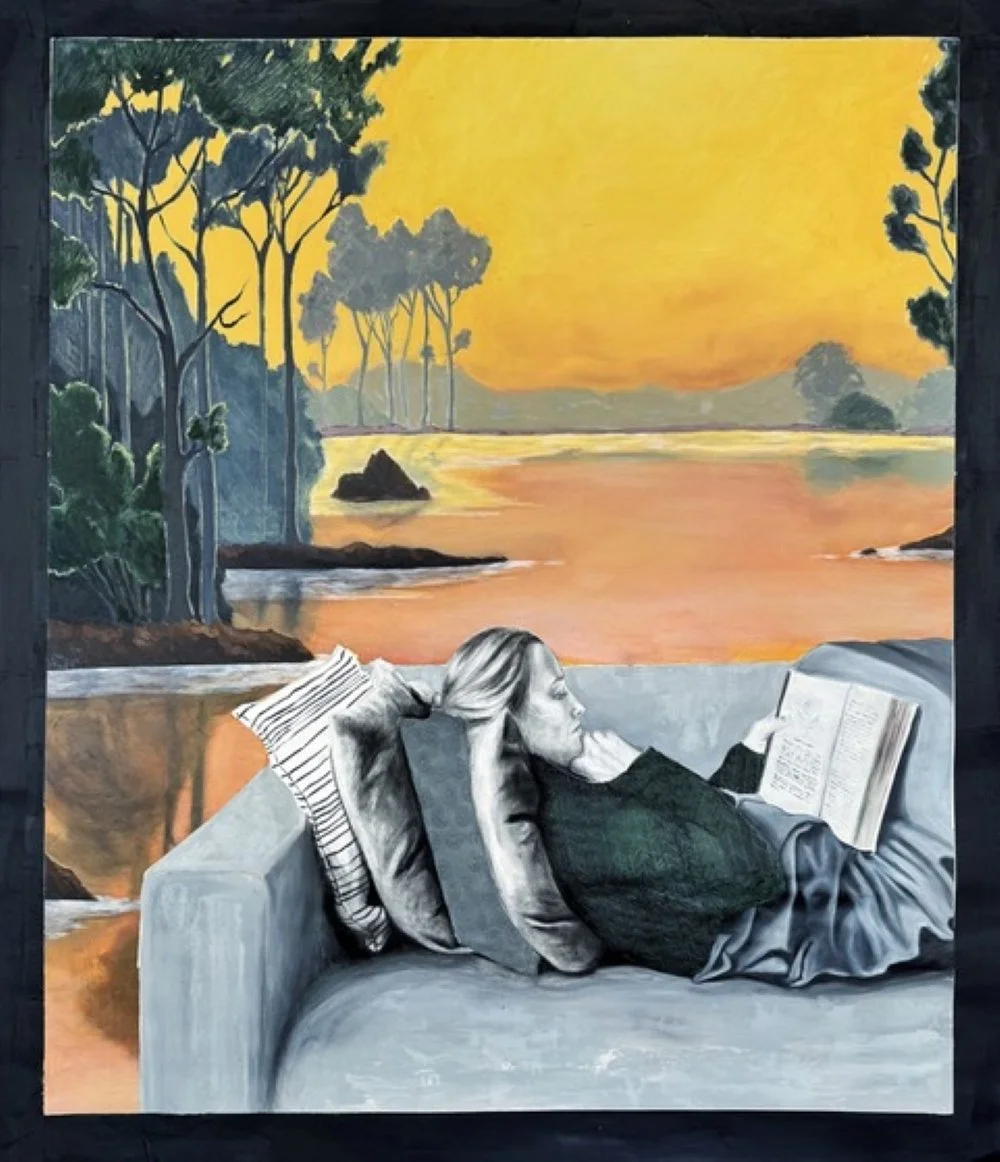 Grayscale painting of a person lying on a couch reading, behind them, a brightly coloured landscape stretches across the background, depicting water, trees and distant hills under a vivid yellow‑orange sky.