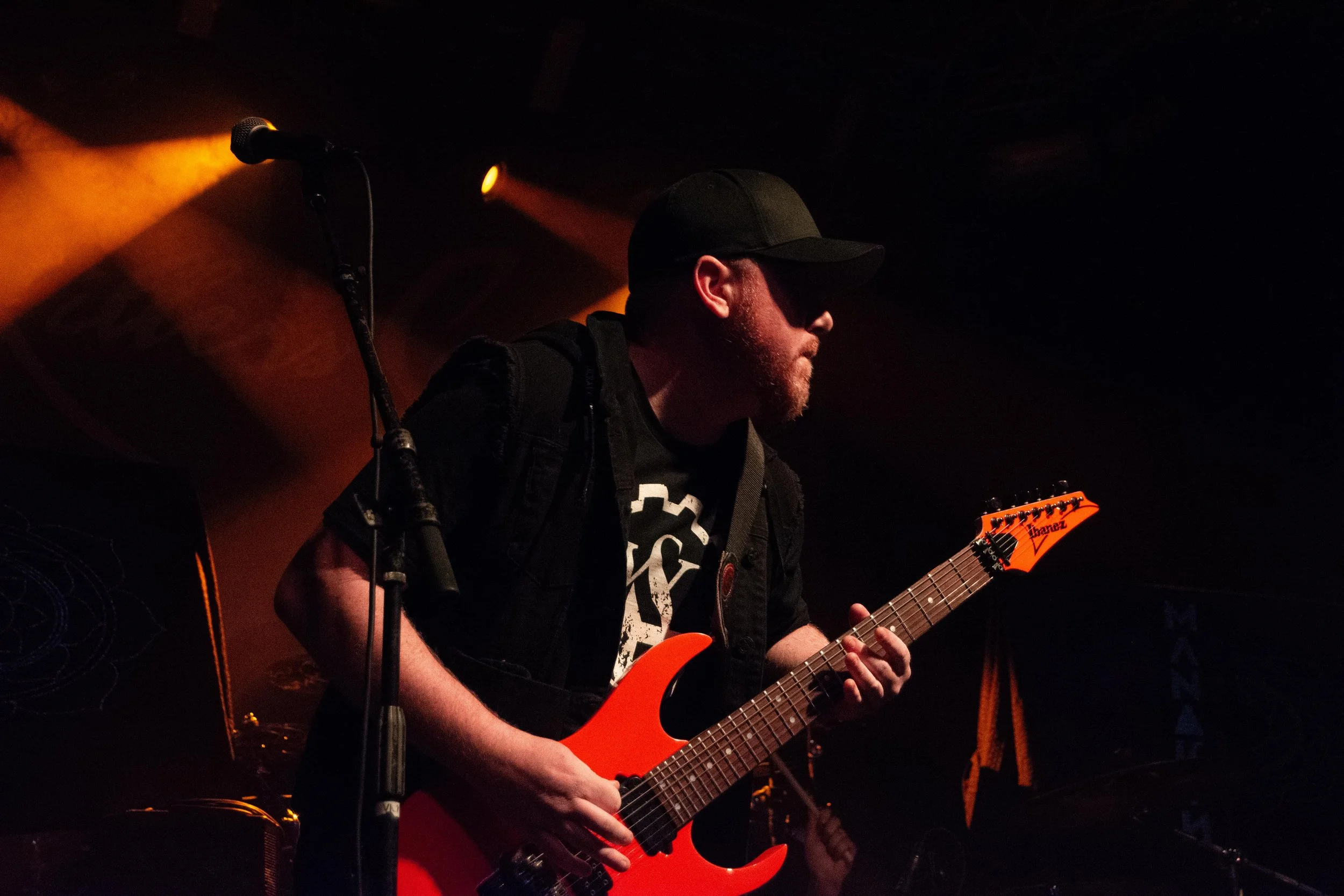 Brian Johnson, the lead guitarist of metalcore band Vent to Atmosphere, plays passionately during a show at The Forge in downtown Joliet on Dec. 19, 2024.