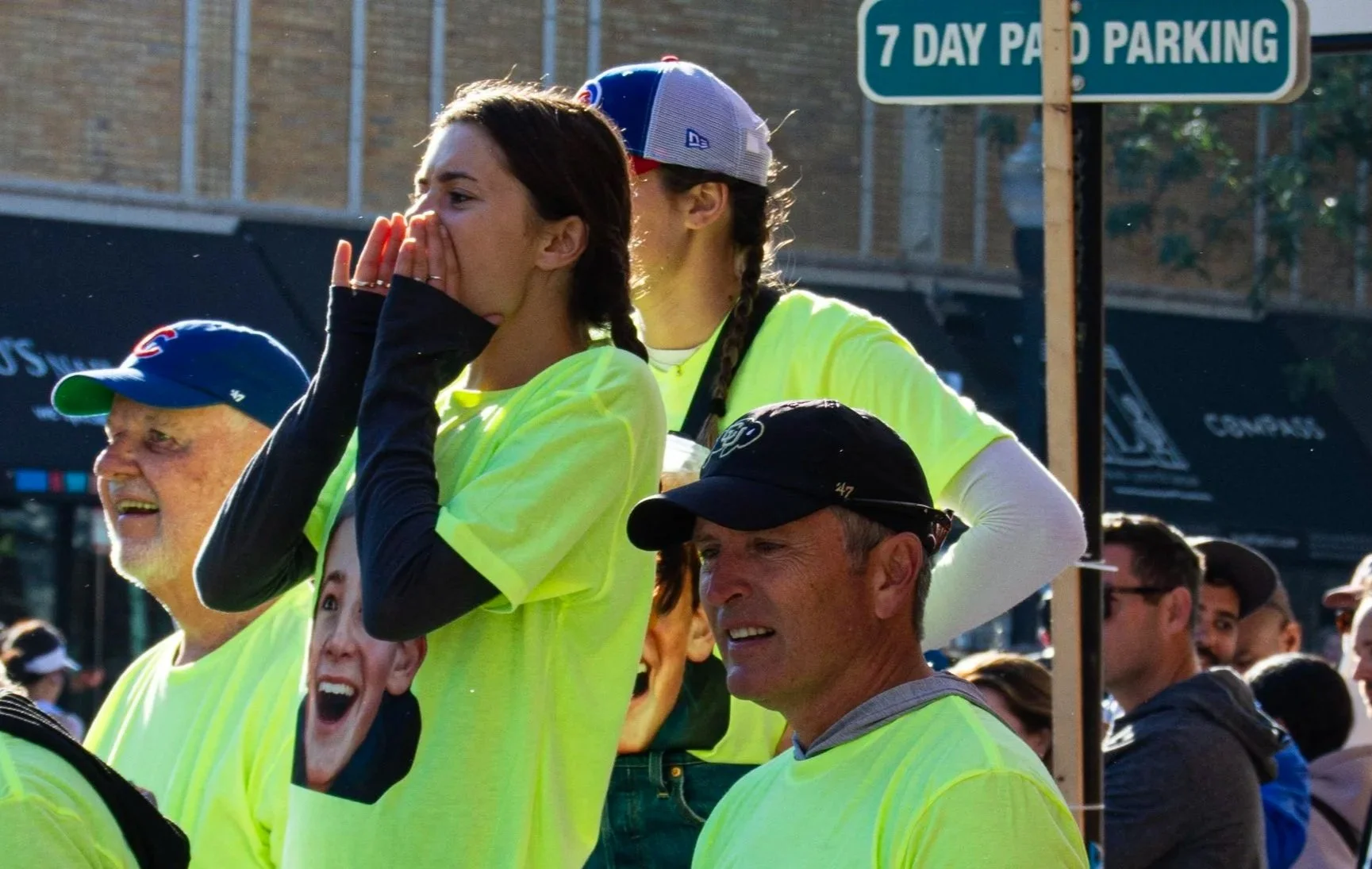 A group wearing matching t-shirts cheer on the runners of the Bank of America Chicago Marathon on Oct. 12, 2025.
