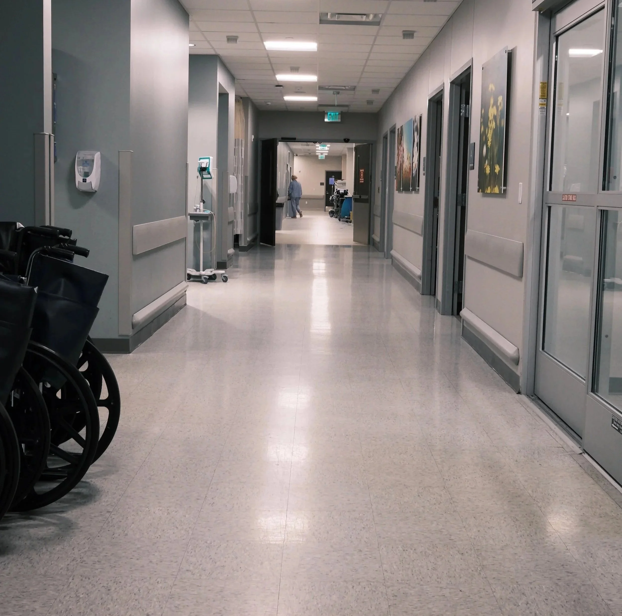 Outpatient surgery center hallway designed for same-day joint replacement recovery.