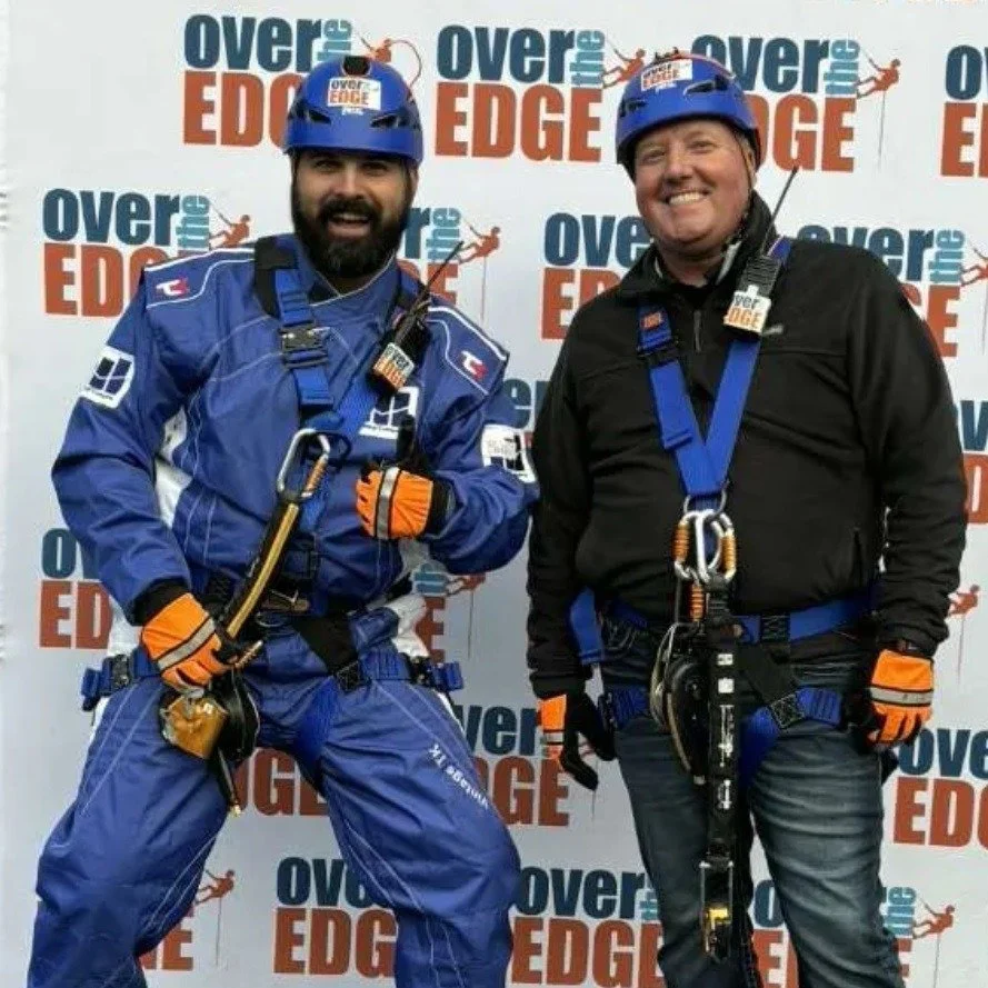 Menke &amp; Company took community involvement to new heights last week!

Two of our team members, Blake and Jay, participated in United Way of Southeast Iowa's Over the Edge event, raising money for a great cause and rappelling off the Farmers &amp;