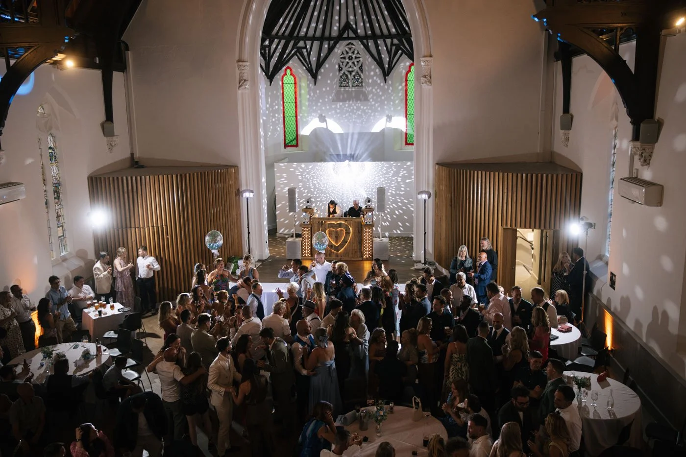 wedding party with disco ball lights inside cornerstone cardiff