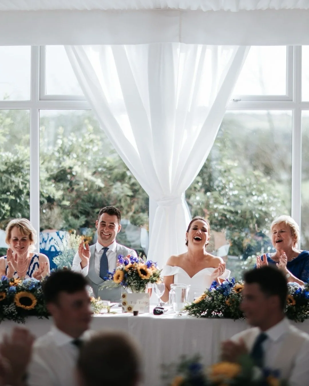 happy couple at the top table during their wedding