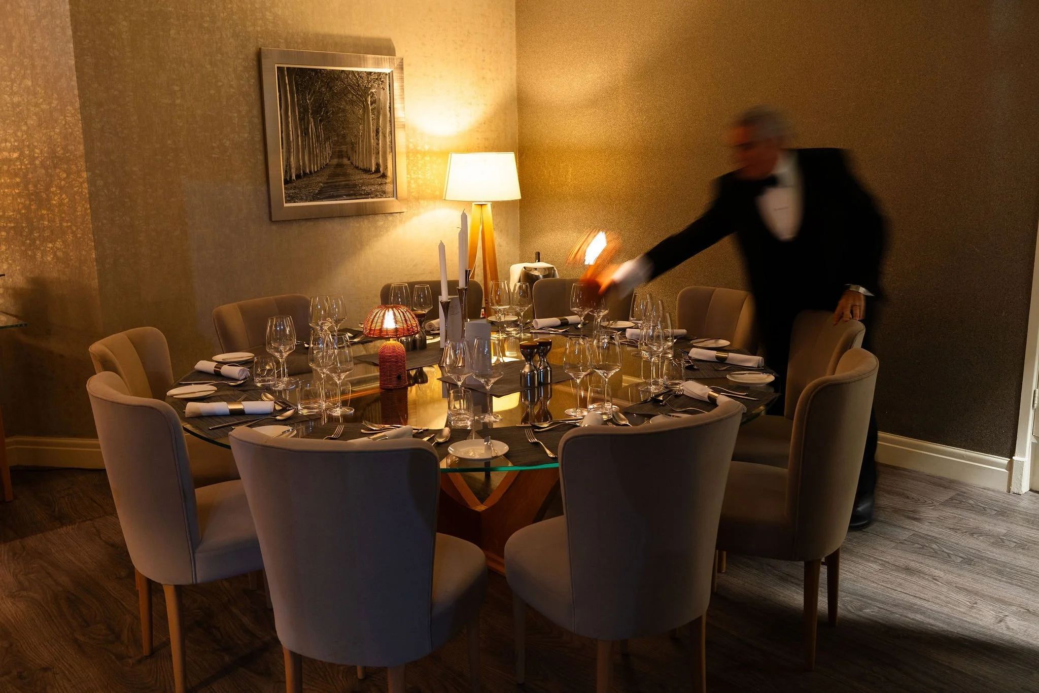 spiro doing finishing touches on private dining table
