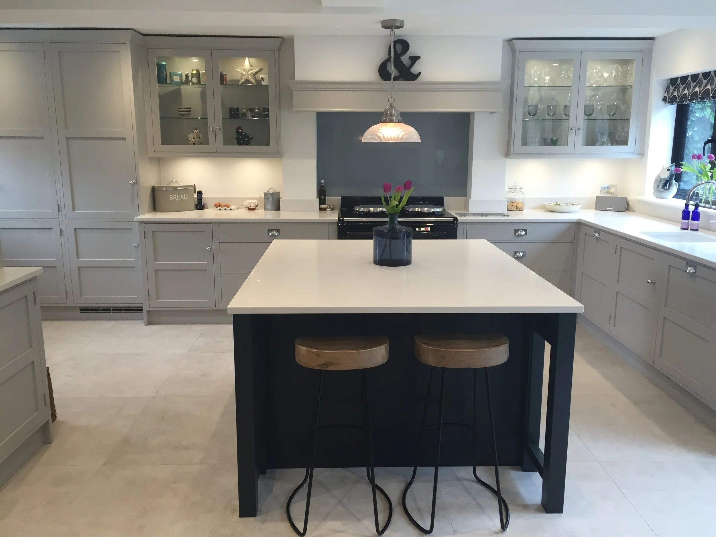 Bespoke painted kitchen with central island in a Kent family home