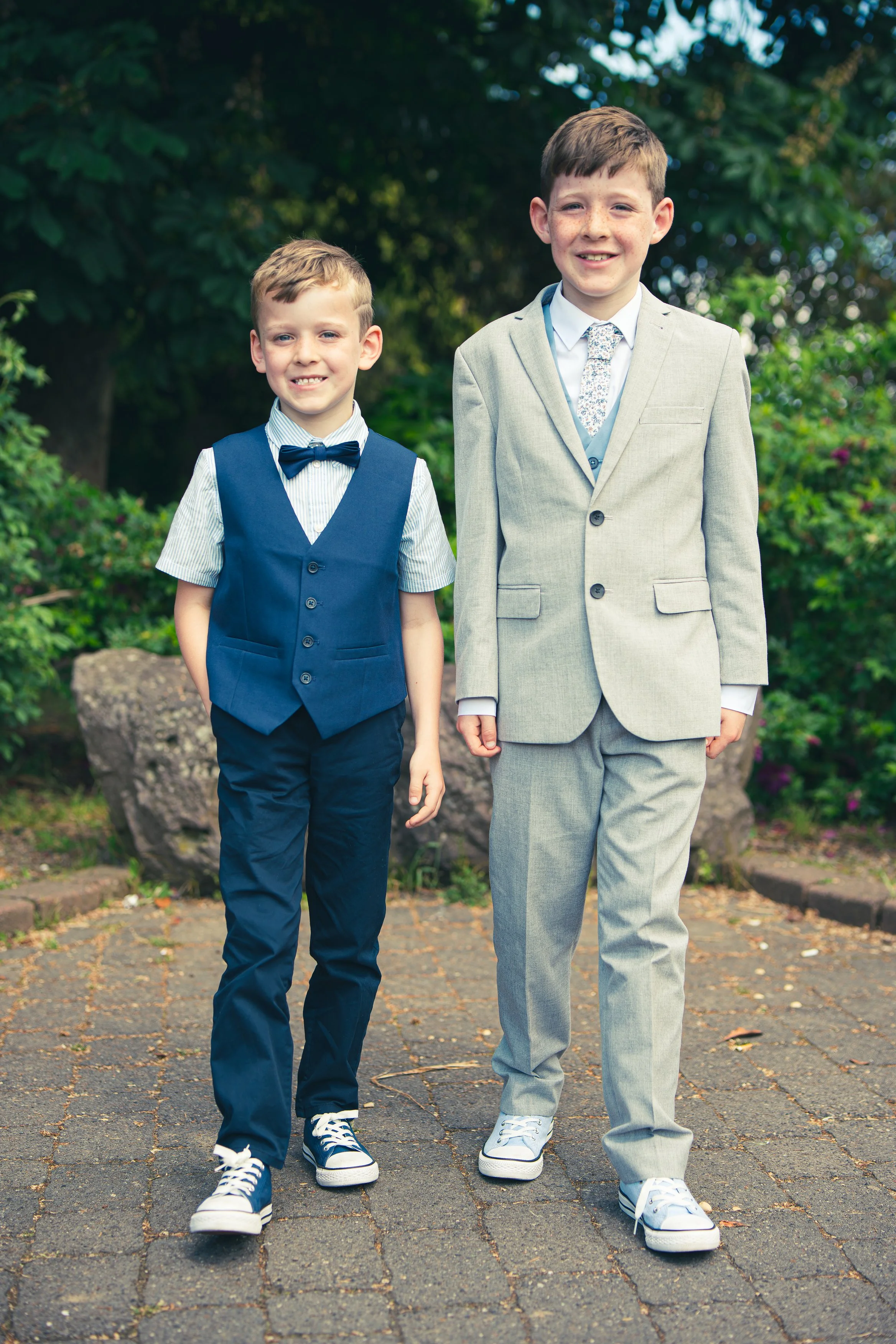 A portrait of two brothers after their first holy communion in Town Park Tralee, Co.Kerry
