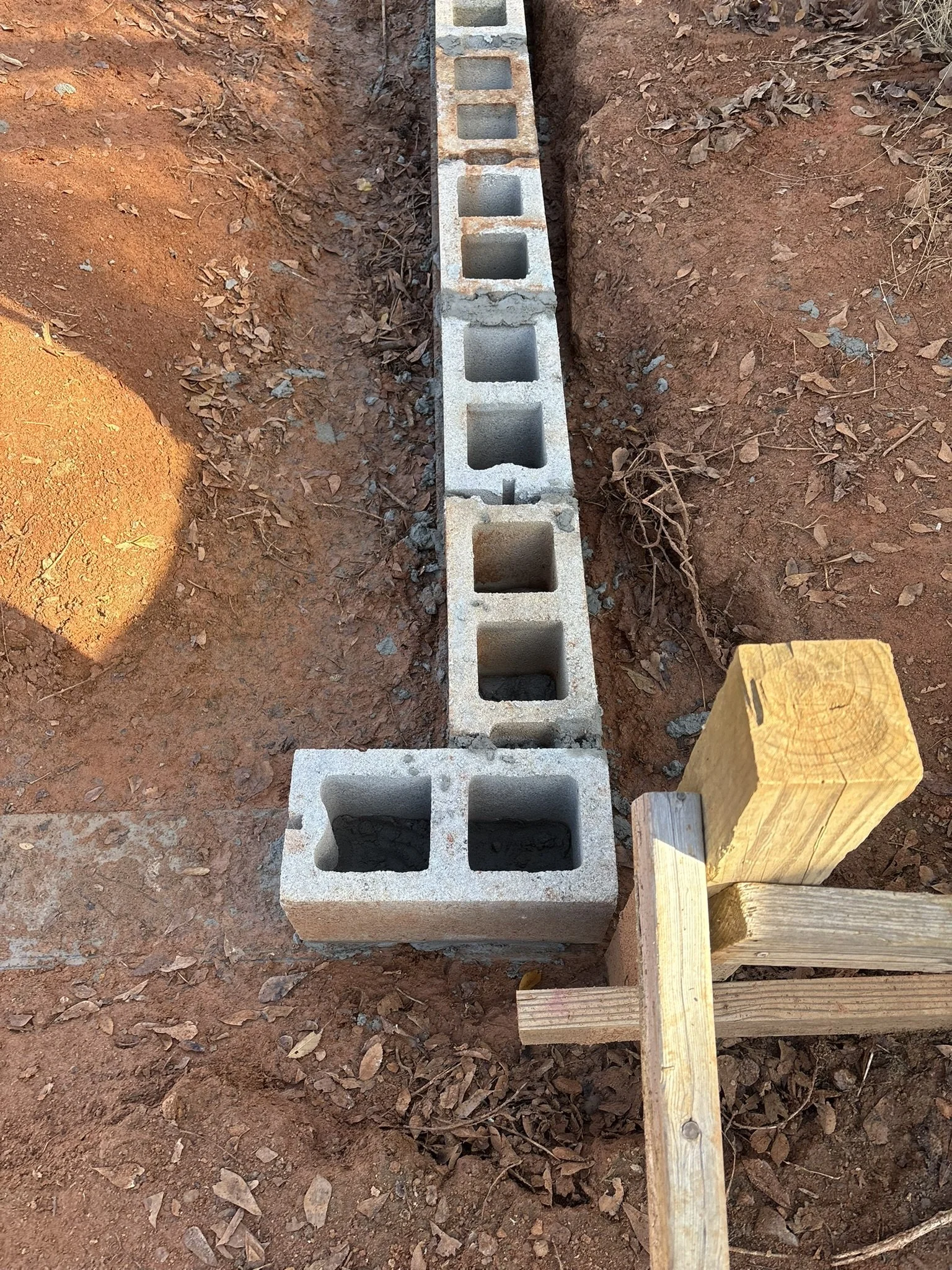 Laying blocks/foundation of a building
