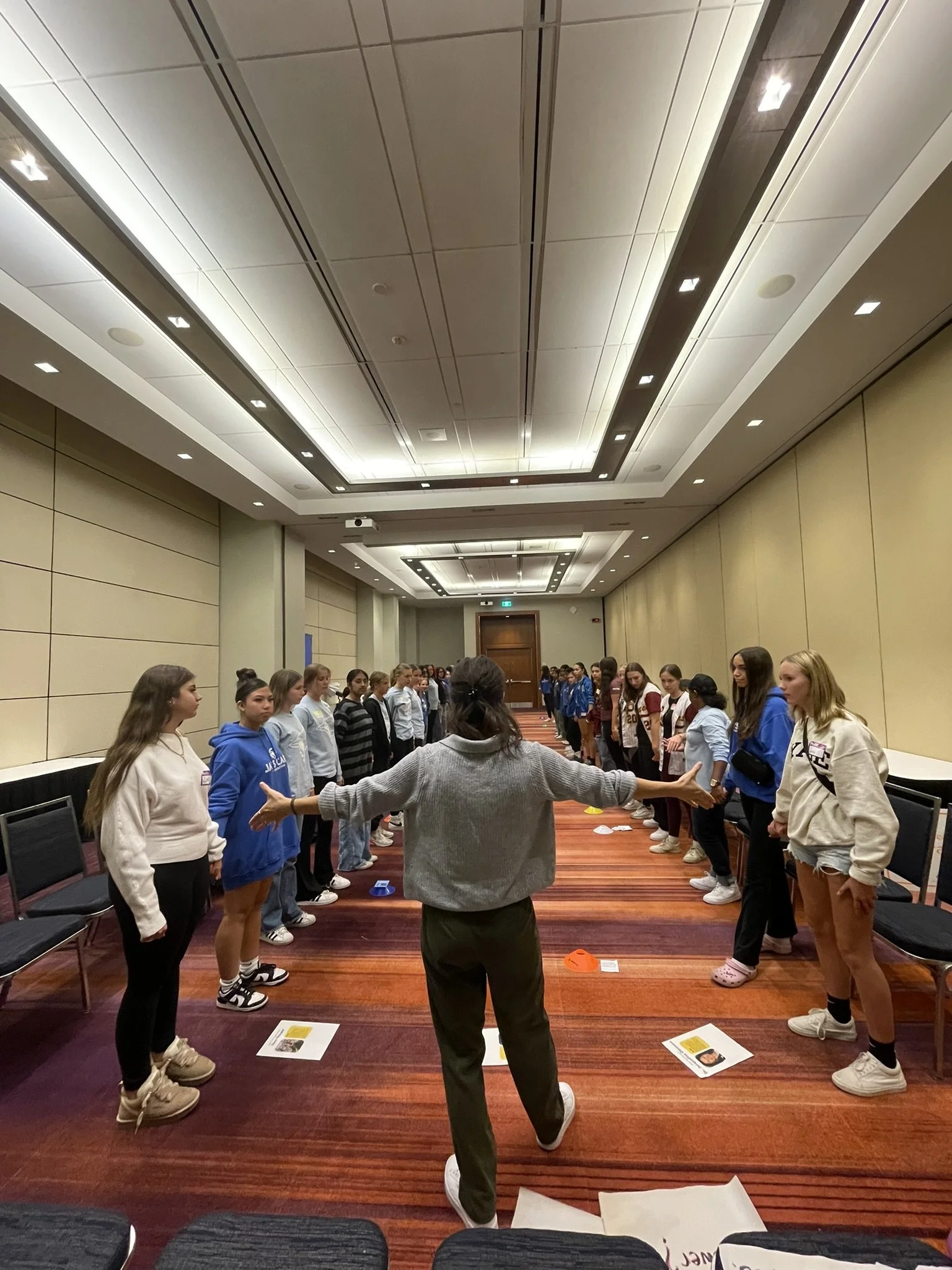 Lyft Counselling speaker presenting at a conference for coaches and teams on mindset, performance, and team development in Toronto, GTA, and Ontario
