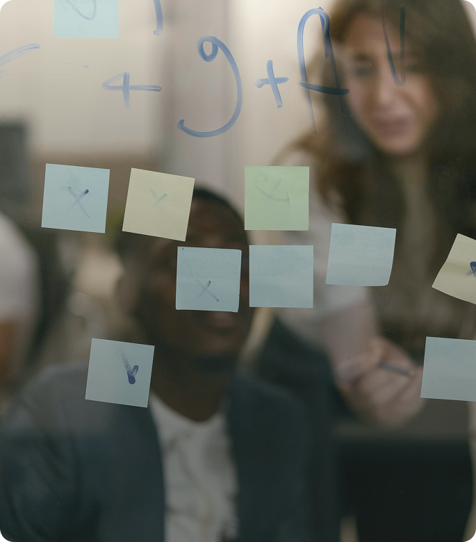 Organisational development consultant working through complex challenges with structured thinking and visual planning