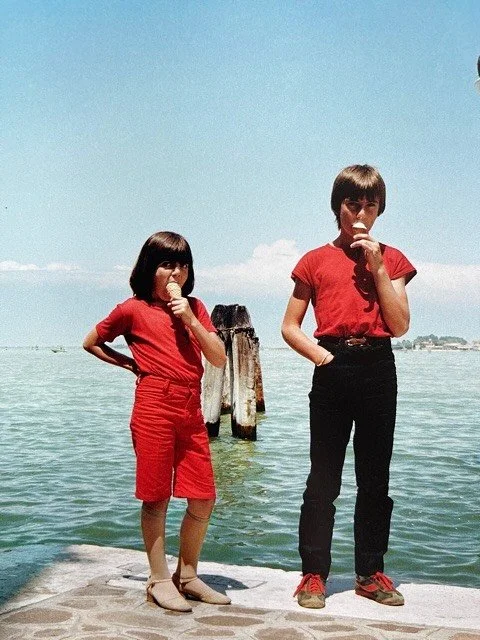 Siblings in red
