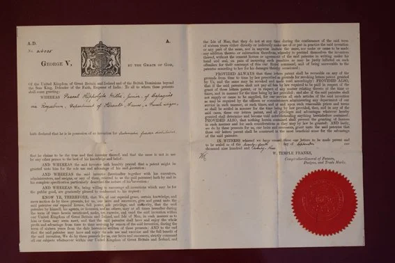Document ancien, probablement une certification ou un diplôme, avec un sceau rouge en bas à droite, écrit en anglais.