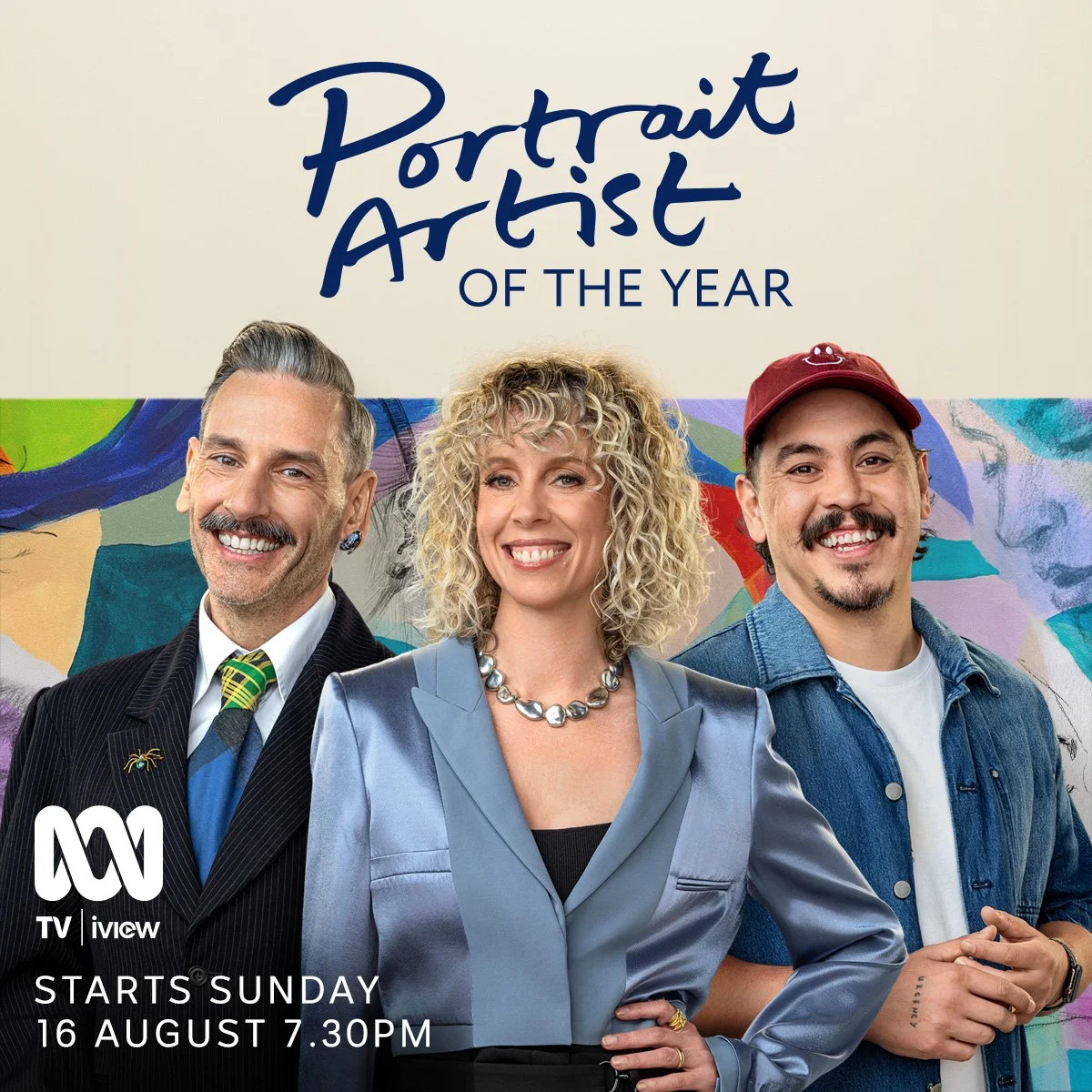 Promotional poster for 'Portrait Artist of the Year' featuring three smiling judges, a man in a pinstripe suit on the left, a woman with curly blonde hair in the center, and a man with a beard and red cap on the right. The background shows colorful a