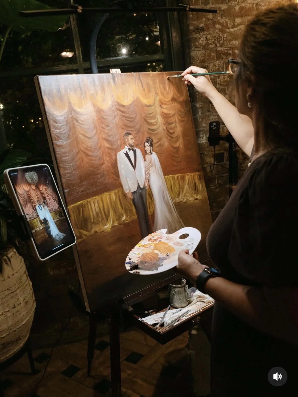 Signature live wedding oil portrait being created by Sydney-based artist Mina.