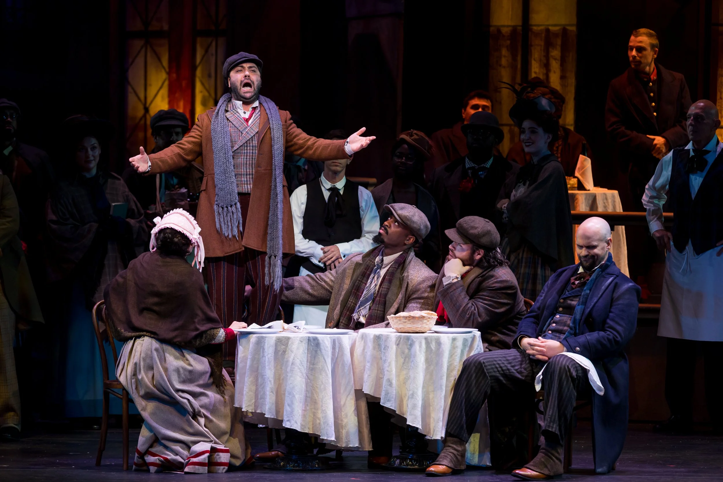 Liparit Avetisyan as Rodolfo, Edward Parks as Marcello, Soloman Howard as Colline, and Mario Manzo as Schaunard perform in Palm Beach Opera's production of Puccini's La bohème at the Kravis Center in West Palm Beach.