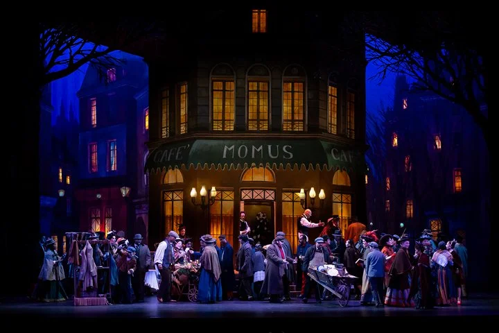 The Palm Beach Opera chorus at Café Momus in Puccini's La bohème, performing live at the Kravis Center.