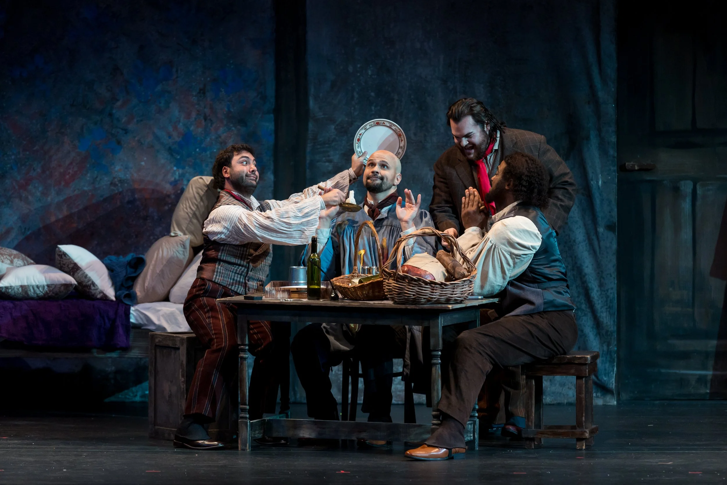Liparit Avetisyan as Rodolfo, Edward Parks as Marcello, Soloman Howard as Colline, and Mario Manzo as Schaunard perform in Palm Beach Opera's production of Puccini's La bohème at the Kravis Center in West Palm Beach.
