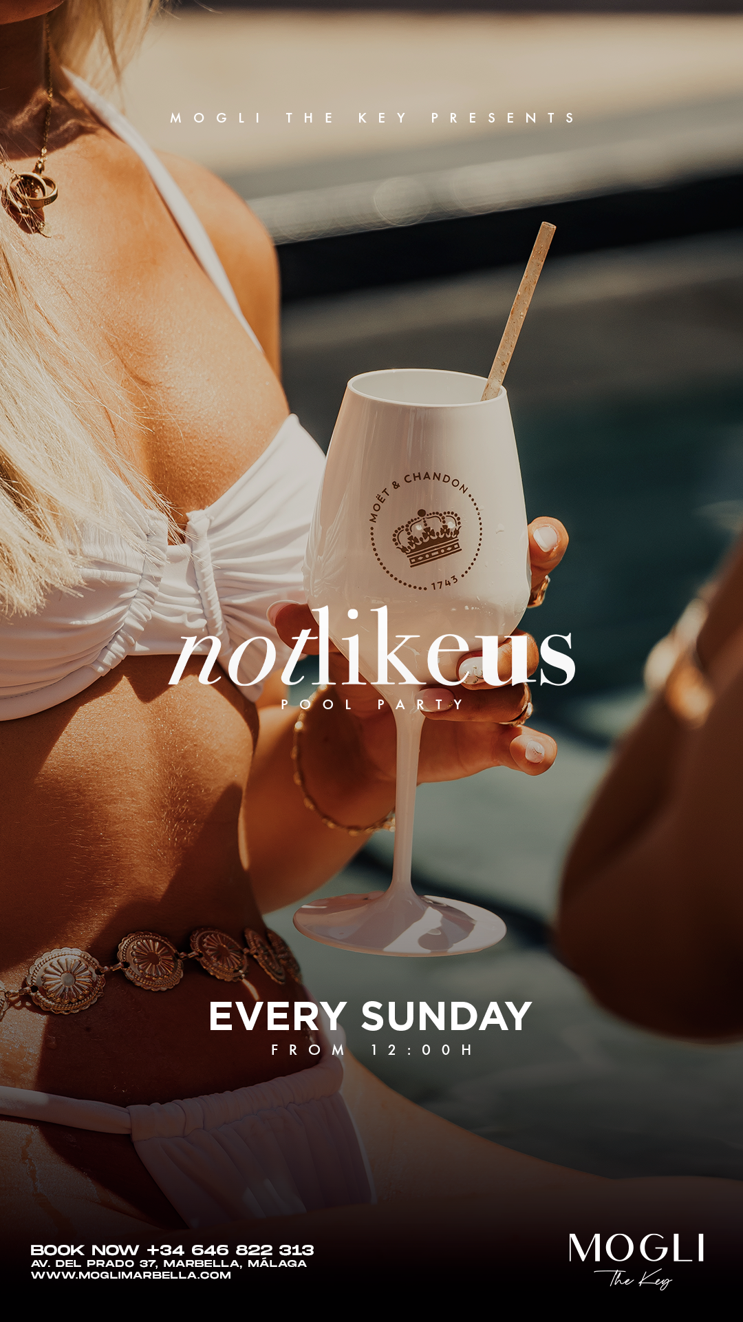 A woman in a white bikini top holding a white Moët & Chandon champagne glass with a straw at a pool party during daytime.