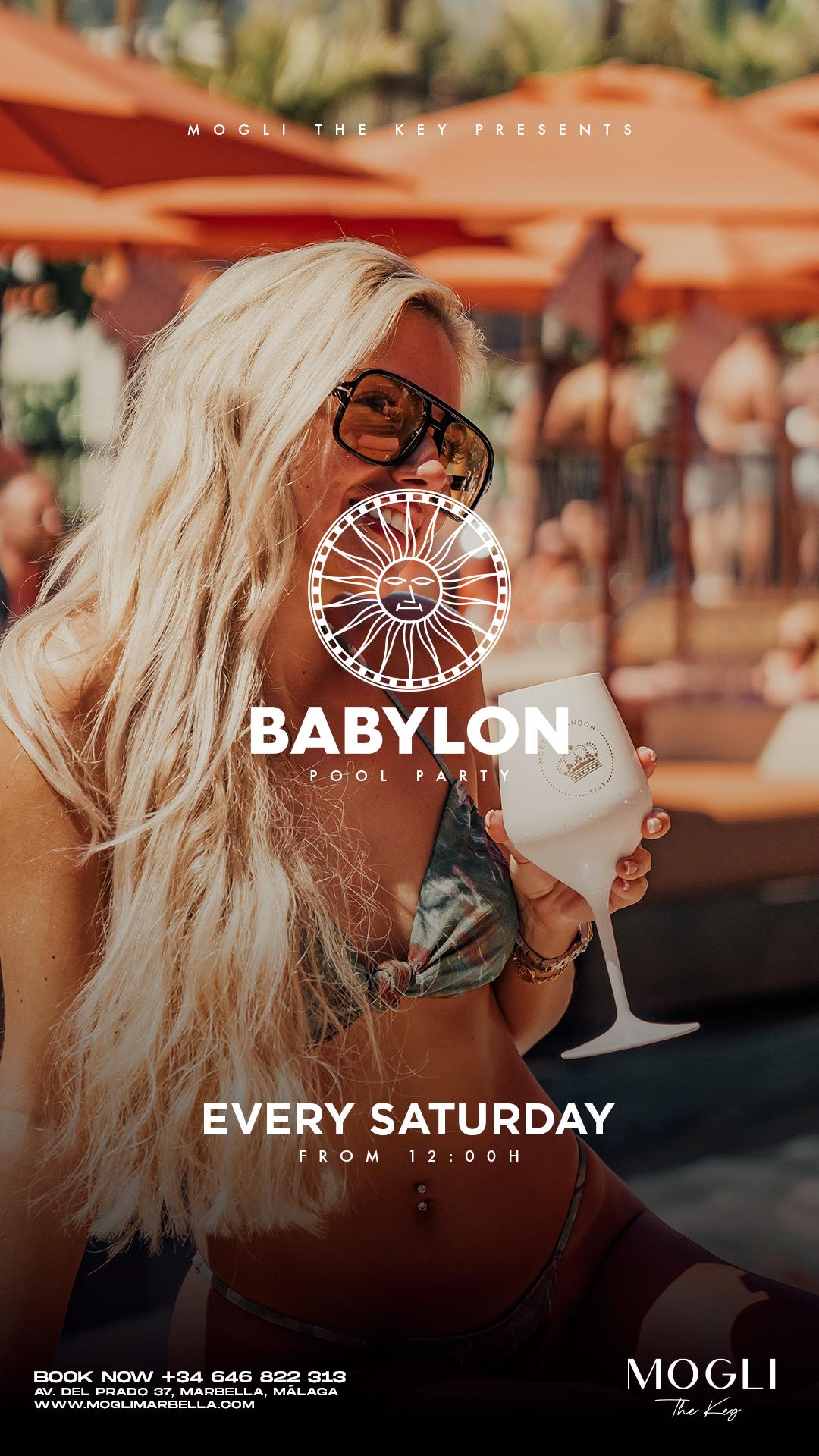 A woman with long blonde hair wearing sunglasses and a bikini holding a cocktail glass at a pool party with orange umbrellas in the background.