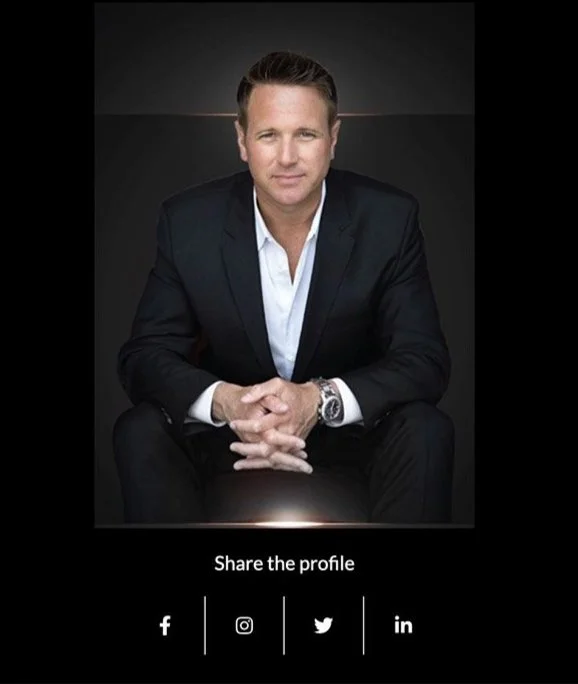 Man in a suit sitting with social media icons for sharing profile