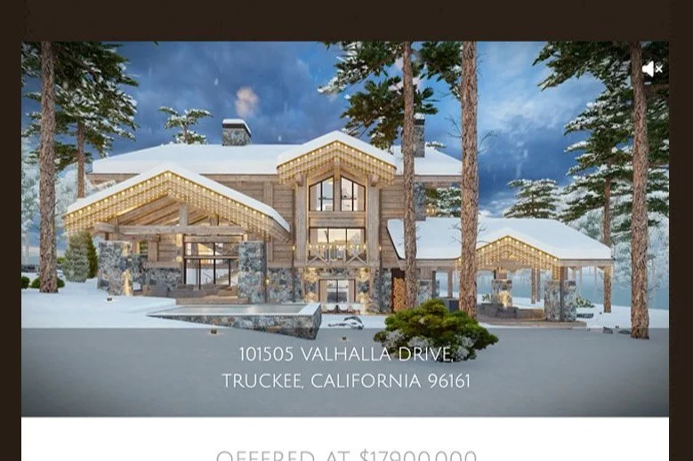 Front view of a large, modern, wooden mountain mansion with snow-covered roof and trees, snowy landscape, and lit windows, located at 101505 Valhalla Drive, Truckee, California.