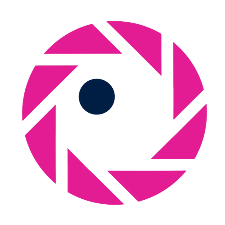 A circular logo resembling a camera shutter with pink segments and a black inner circle.