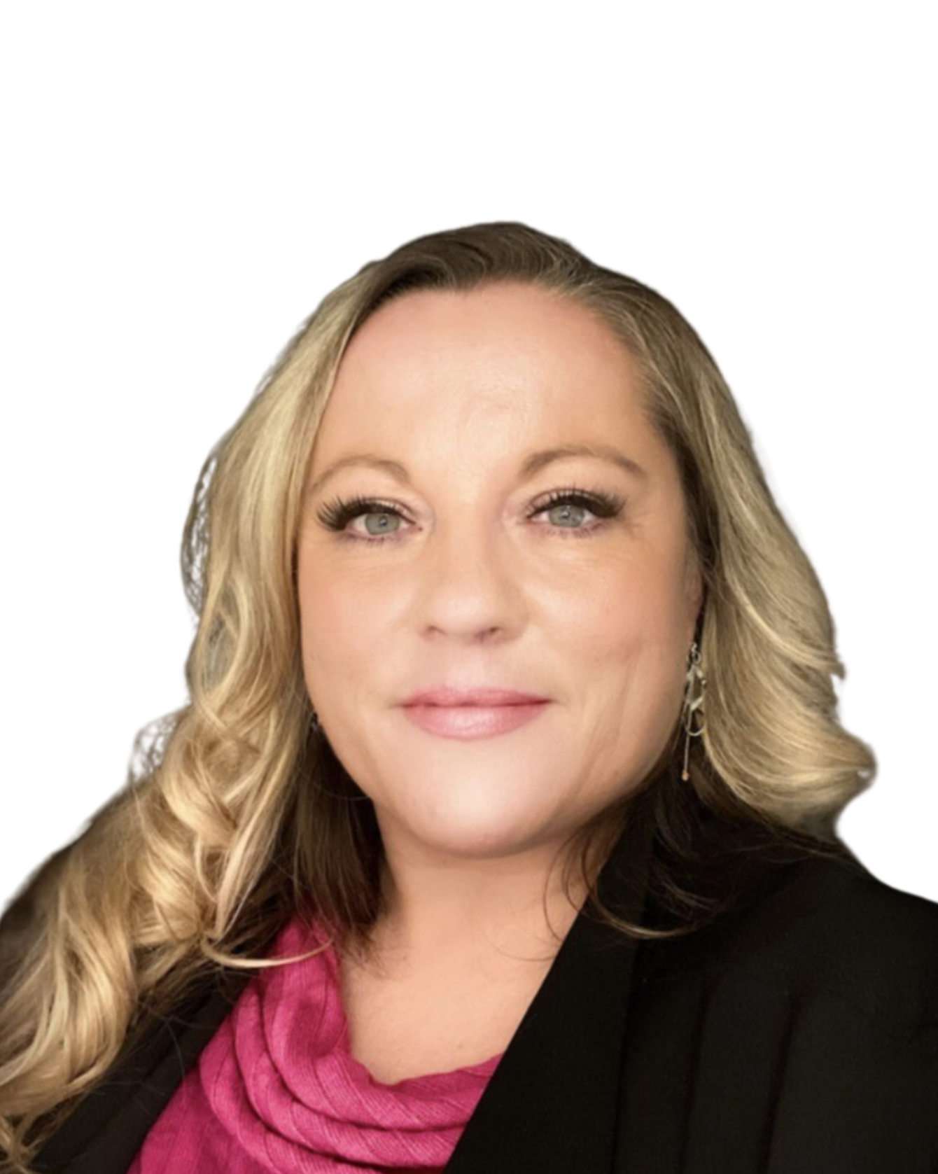 Close-up of a woman with blonde, wavy hair, wearing a black blazer and a pink top, smiling softly against a plain white background.