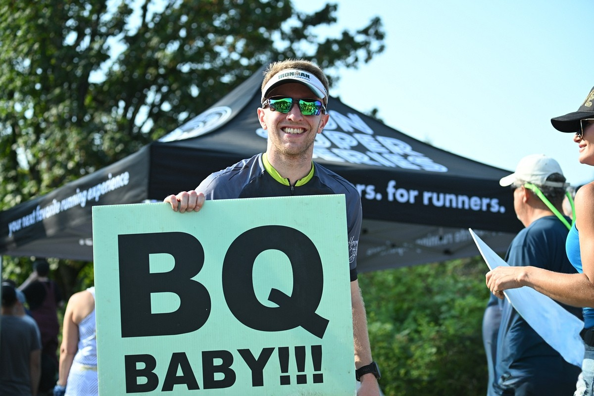 Runner BQ finish line celebration Run Super Series Downhill Races