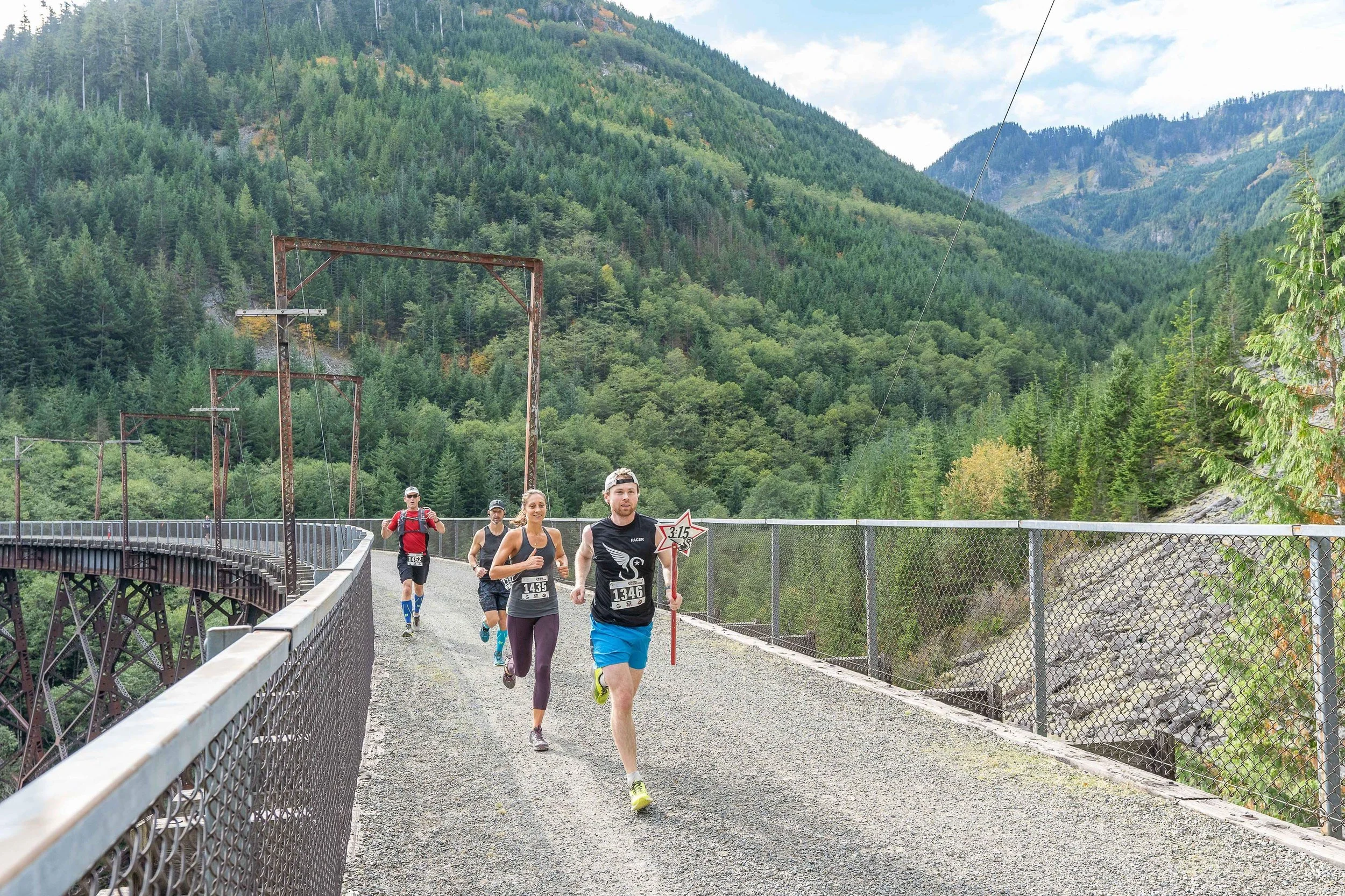 Marathon Runners with Pacers on the bridge at the Downhill Super Series | Super Hyak, Cascade Express, Jack & Jill Course