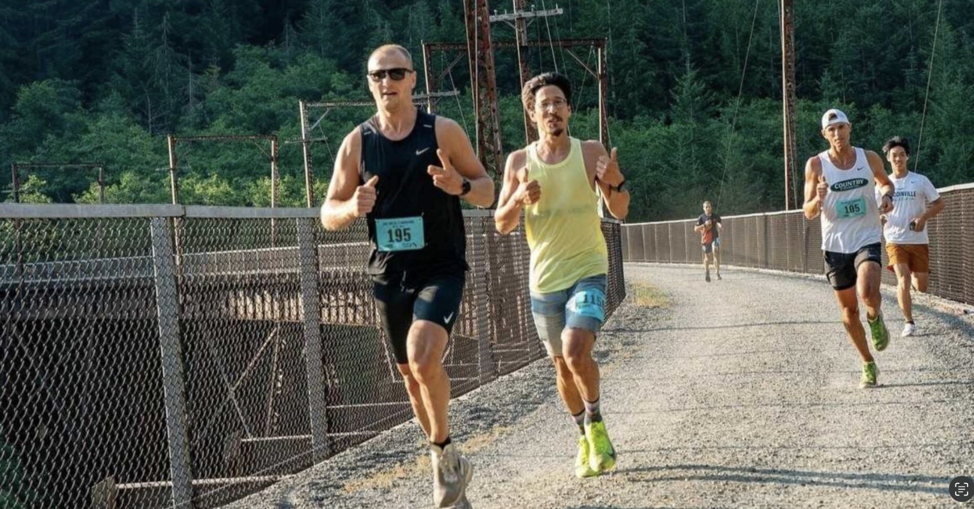 Marathon Runners at on the bridge tressel in Washington at the Downhill Super Series | Super Hyak, Cascade Express, Jack & Jill Course