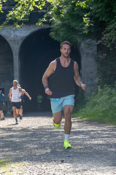 Runner exiting the snoqualmie tunnel run super series downhill races