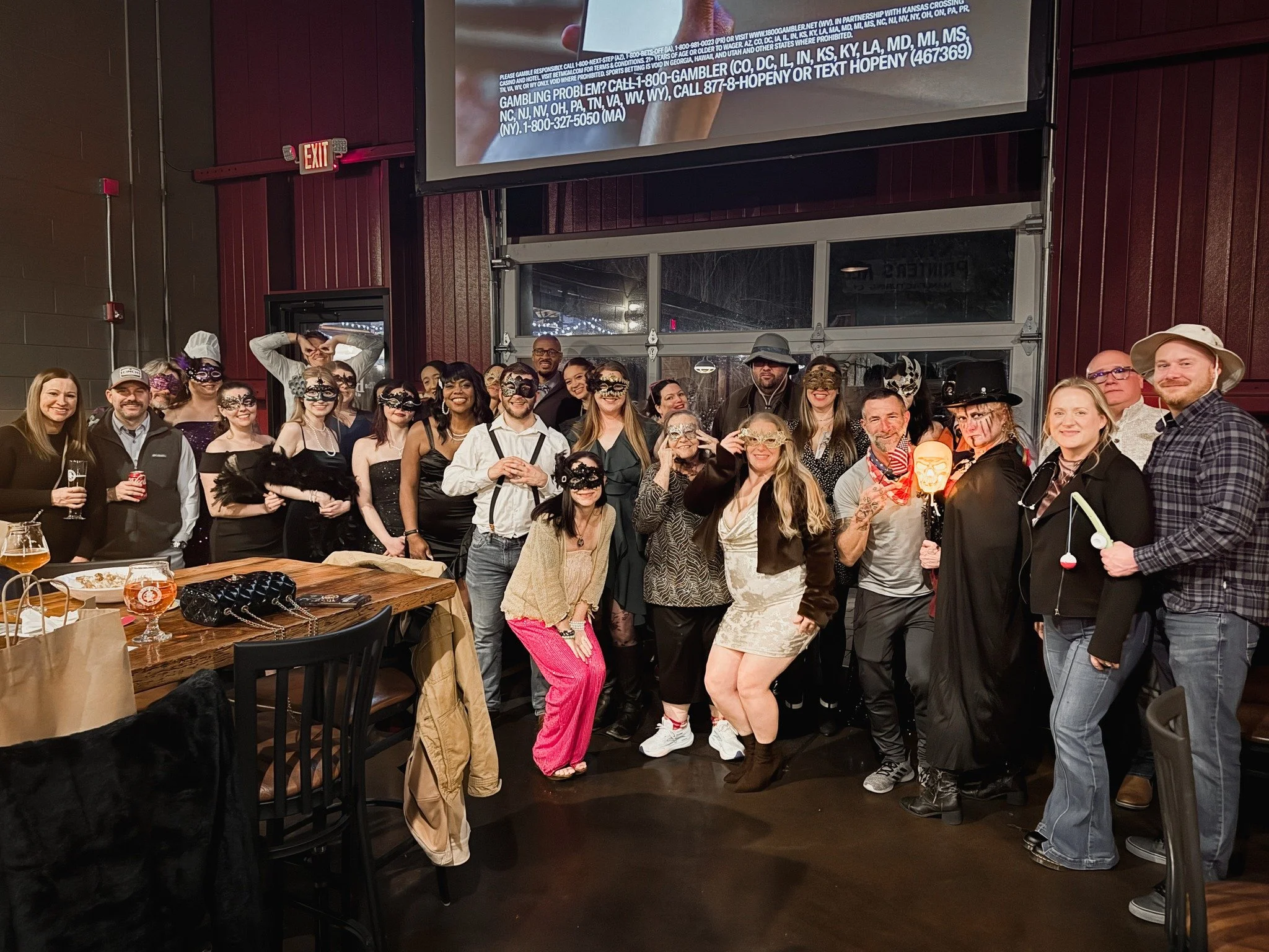 a group posing after the masquerade massacre