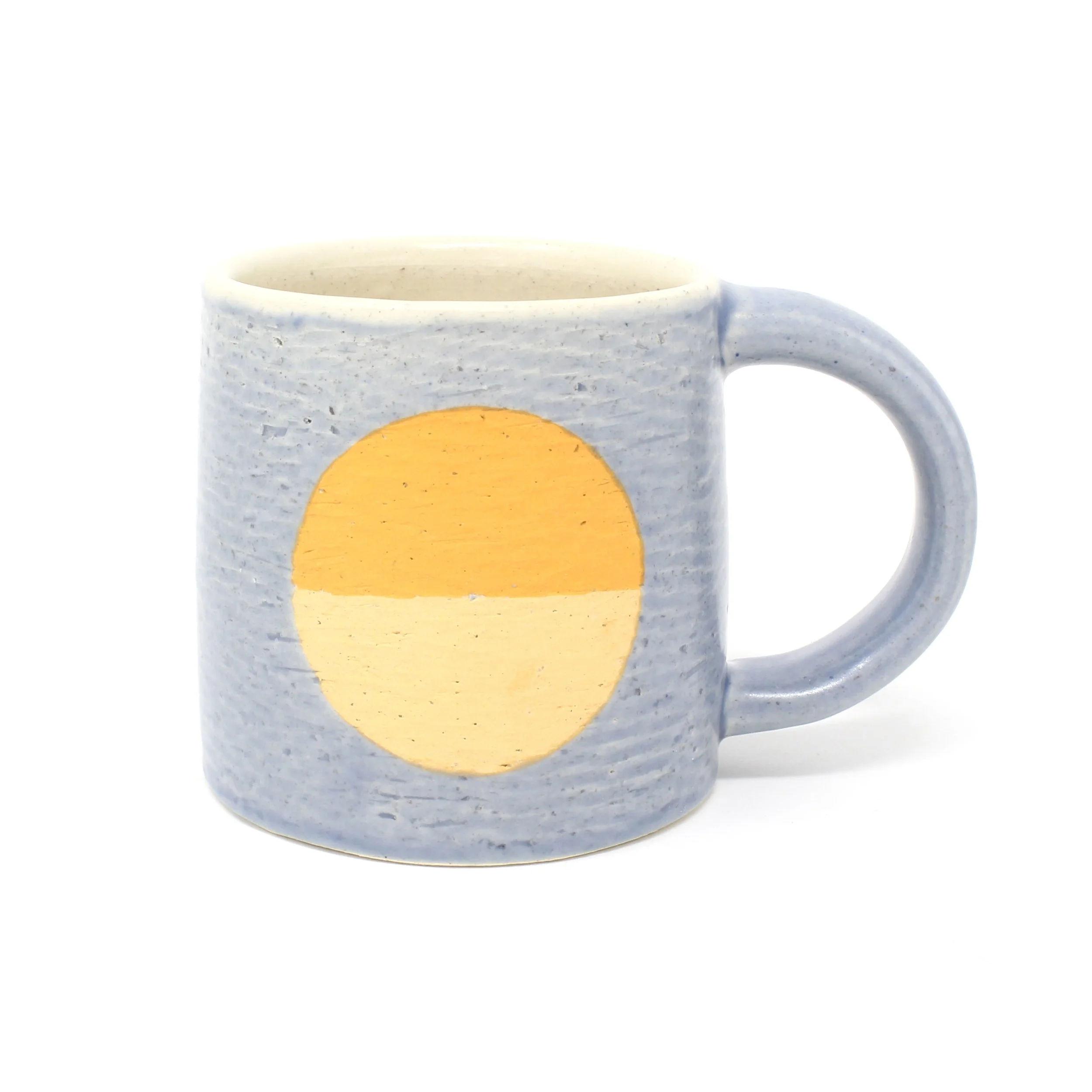 small blue mug with orange circle