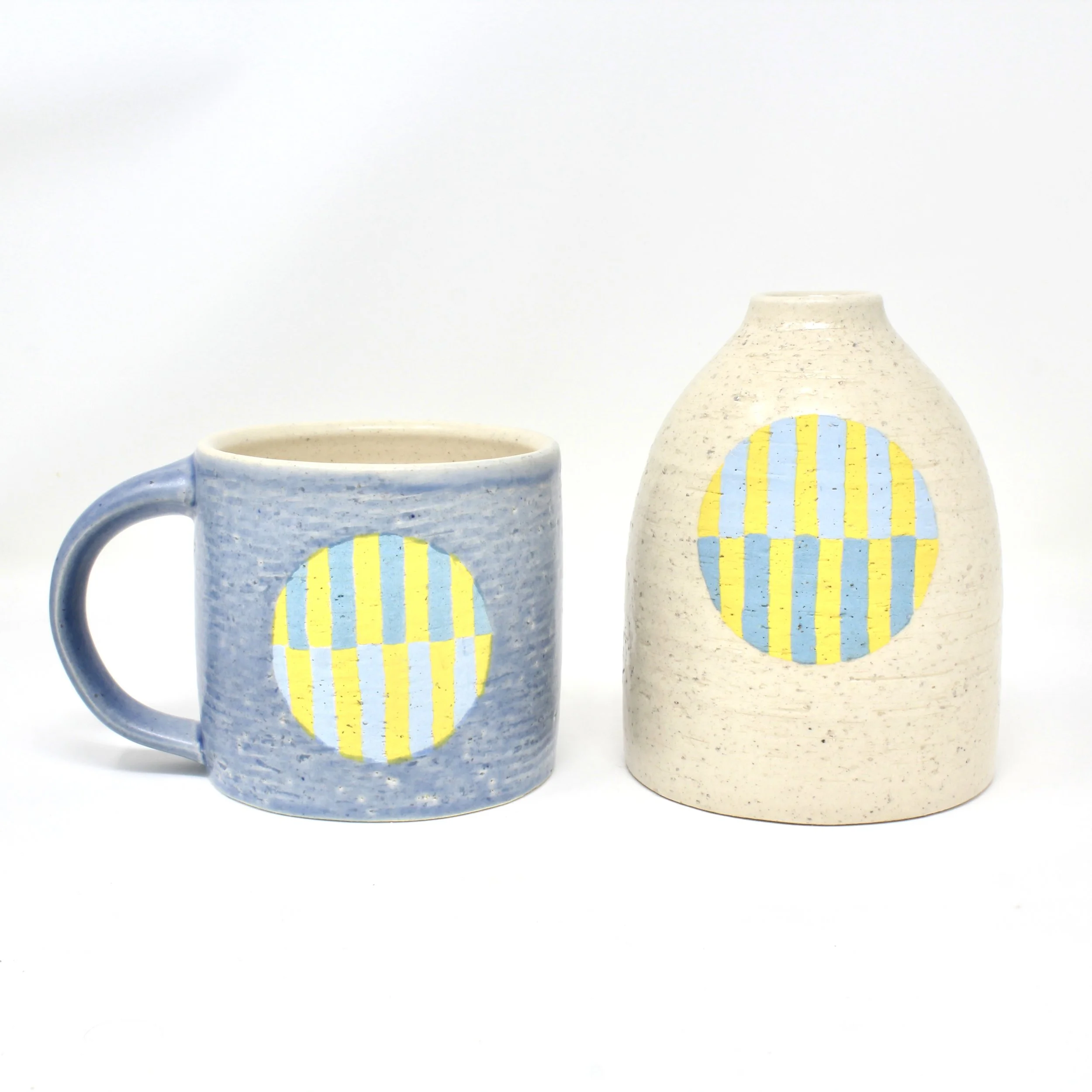 Blue striped mug and vase with blue stripes