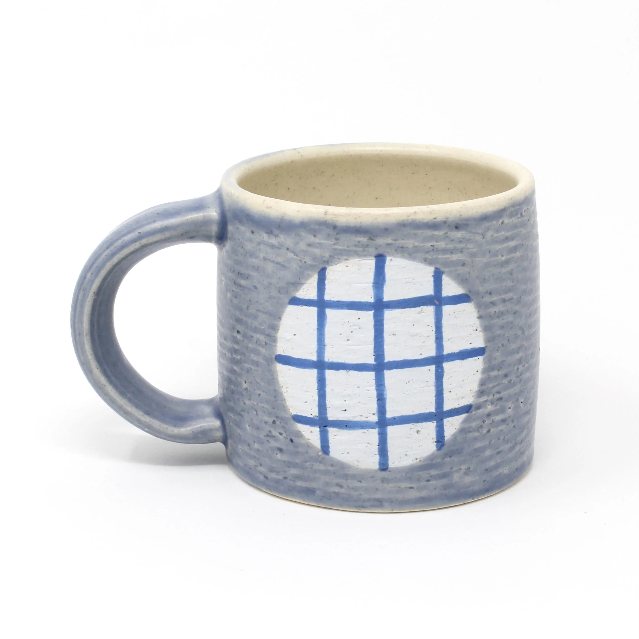 blue cup with blue plaid design