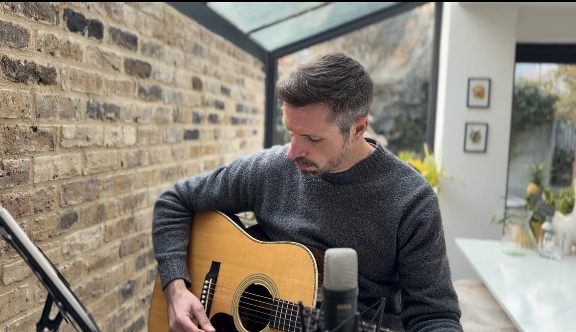 Learn Guitar Through Real Songs