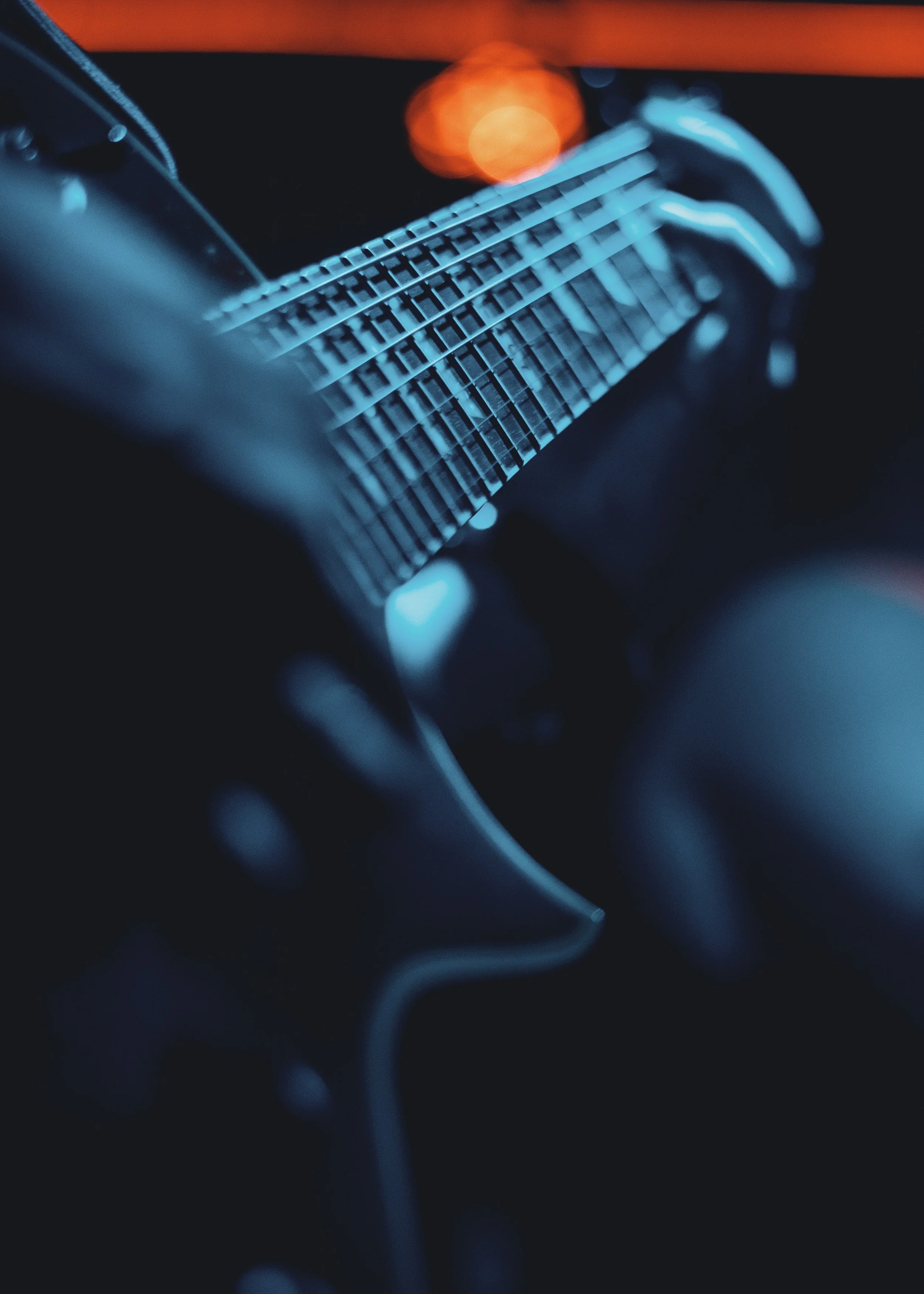 Adult learning to play guitar in South West London