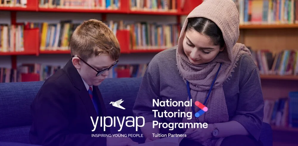 Photo of a Yipiyap tutor supporting a learner, overlaid with the Yipiyap logo and the National Tutoring Programme Tuition Partners logo.