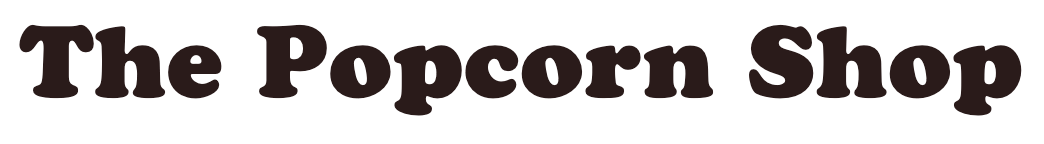 Sign reading 'The Popcorn Shop' in bold, playful font.