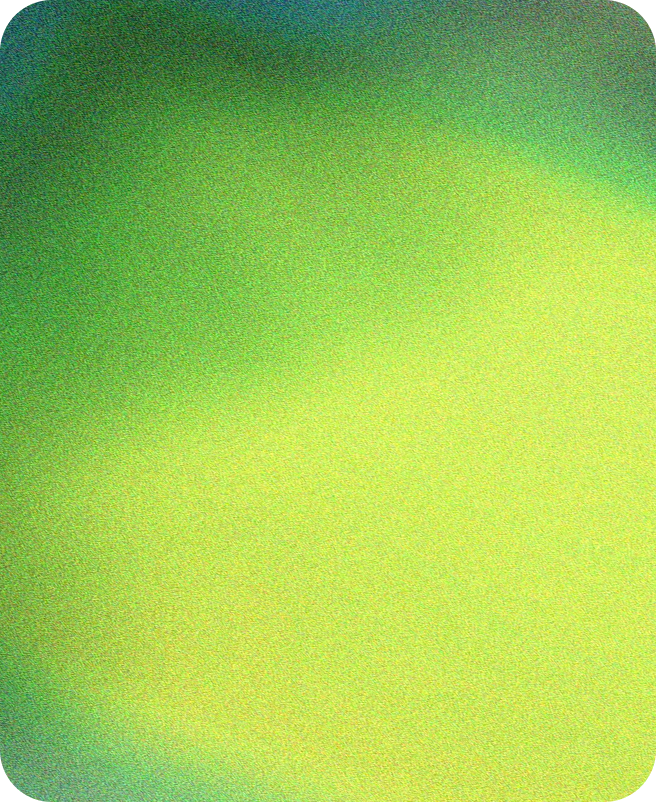 A blurred, pixelated image with green and yellow gradient.