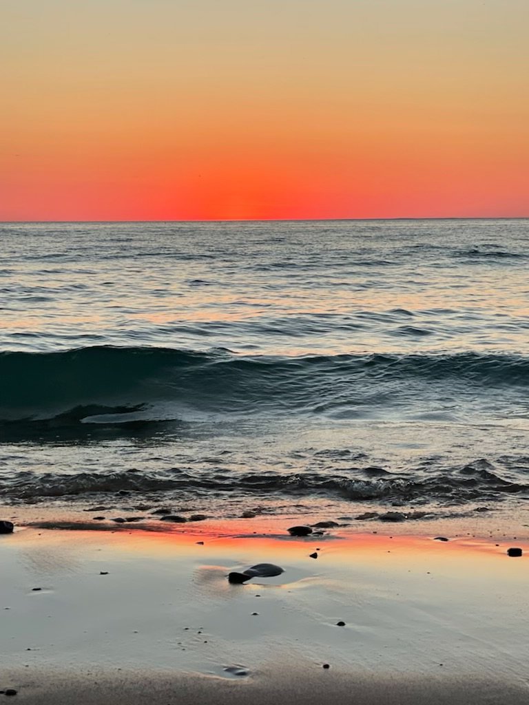 Sunset on the water with beach access less than 10 minutes away.